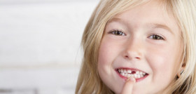 Child missing front tooth