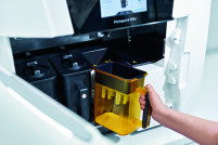 PPS workflow image assistant inserting Primeprint Box in PPU close up
