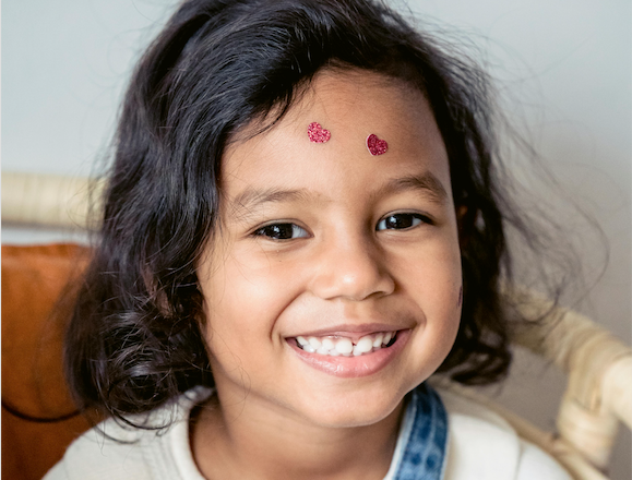 Niña sonriente pexels